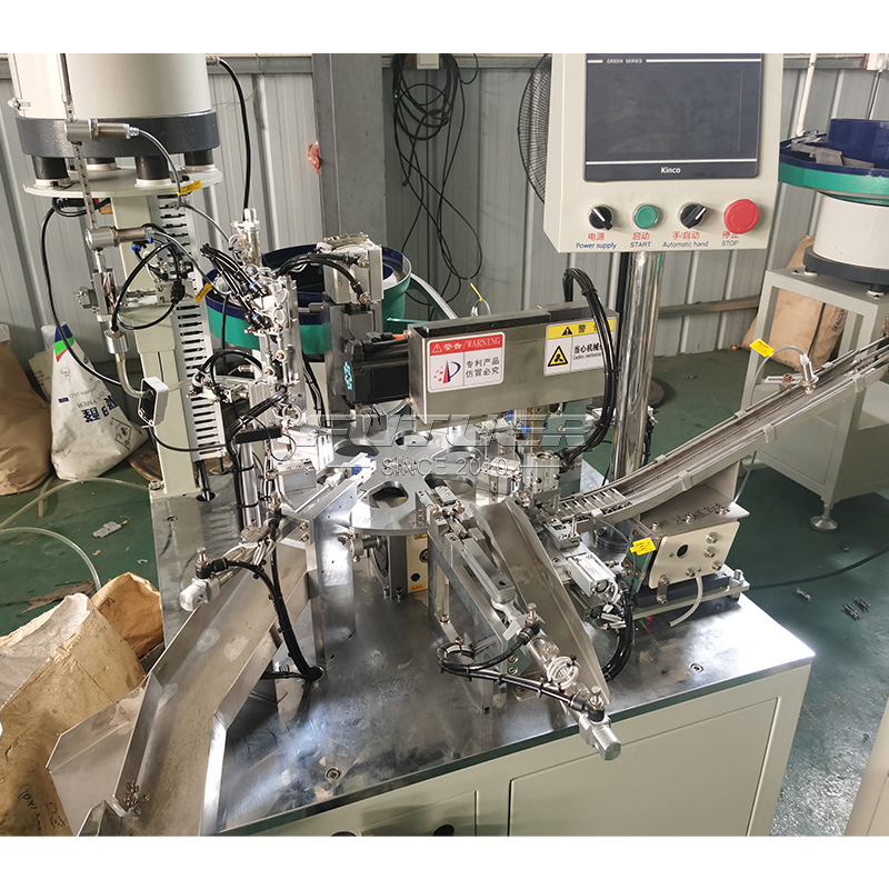 Hinged-dump-arm-assembly-machine.jpg
